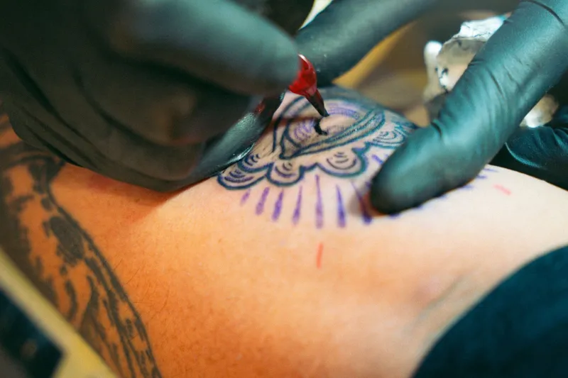 Logo'd for Life: The Band Tattoos and Festival Marks Flooding American Parlors Right Now